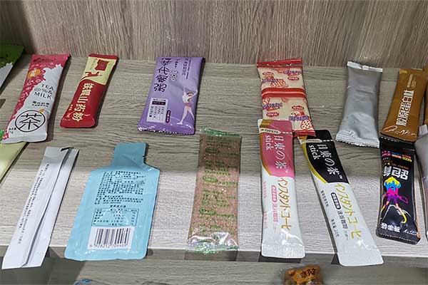 奶茶粉末包裝機可采用三邊封、四邊封、圓角袋型